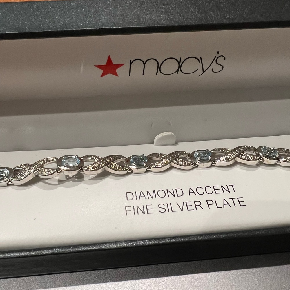 Silver Blue Topaz Infinity Bracelet
